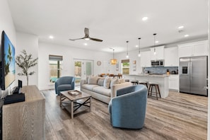 House, Pool View | Living area | 65-inch Smart TV with digital channels, Netflix, Hulu - Beach House - Sunny Sands  (Panama City Beach)