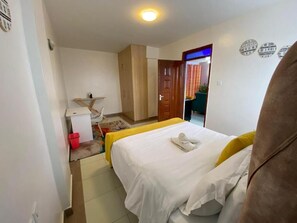 Apartment, Balcony, City View | Desk, laptop workspace, iron/ironing board, free WiFi - AirBnB Thika Road (Nairobi)