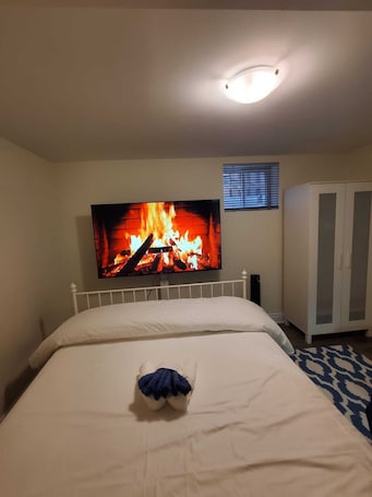 2 bedrooms, free WiFi, bed sheets. Quiet 2BR Basement Suite • Private Entrance • Parking • Near Square One