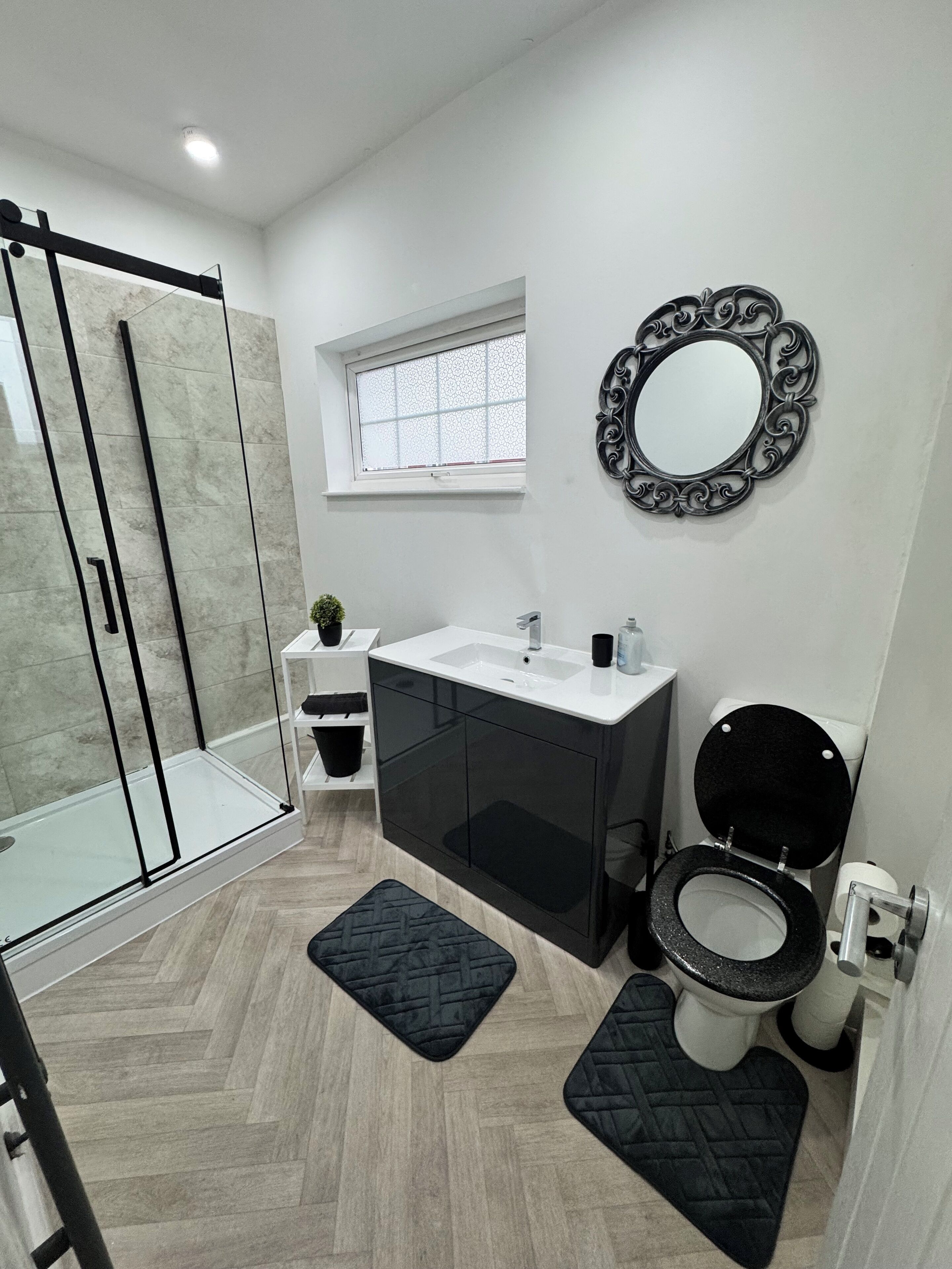 Shower, towels, toilet paper