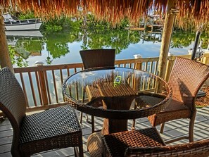 Outdoor dining - Dolphins Cove | Direct Gulf Access, Heated Pool, Tiki Hut (Hernando Beach)