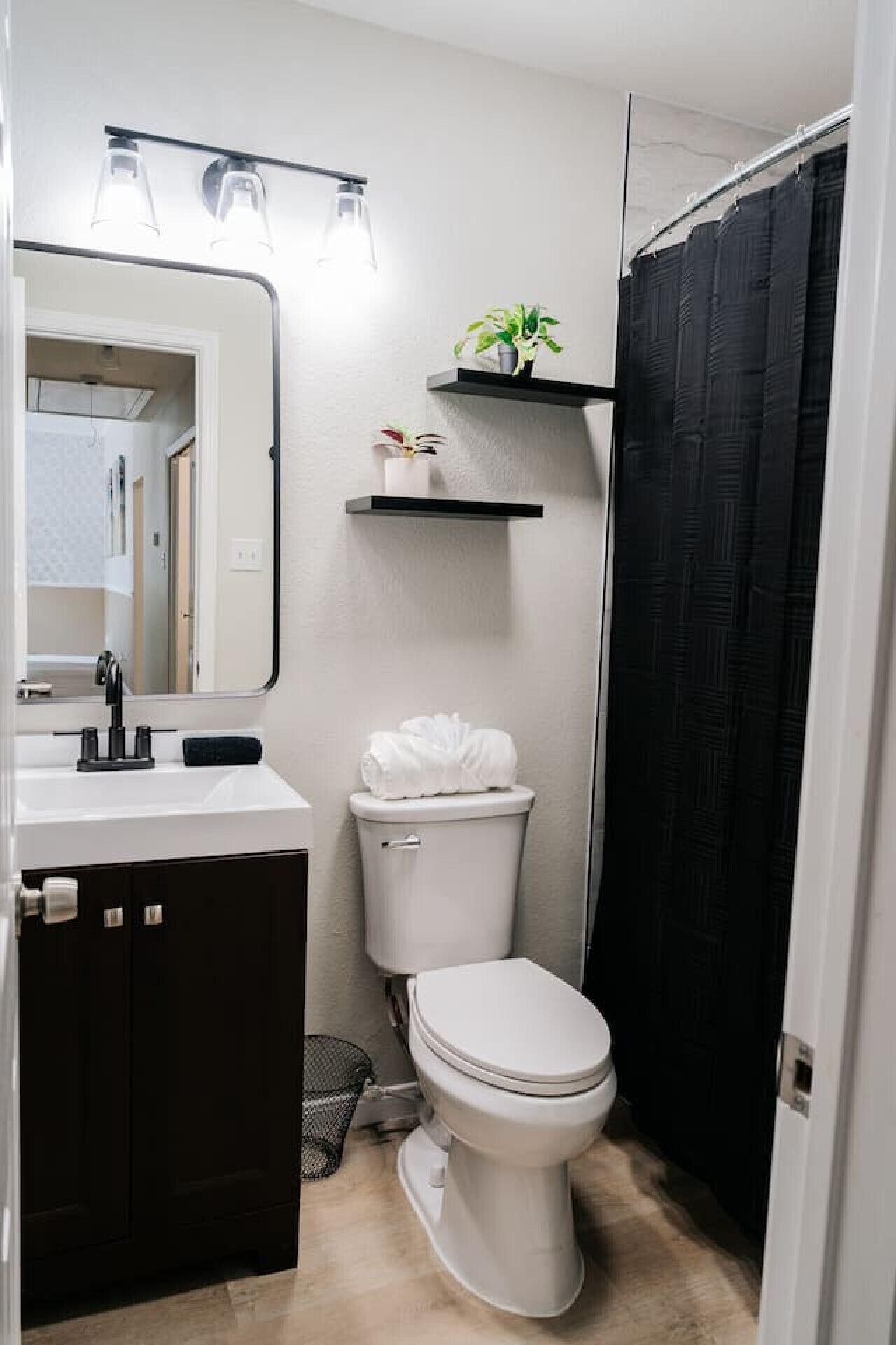A spacious bathroom with double sinks, generous counter space, and plenty of storage— ideal for comfort, convenience and easy mornings.