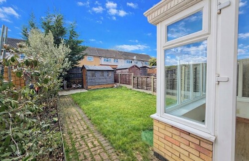 Spacious 3-Bed Home with Garden & Parking