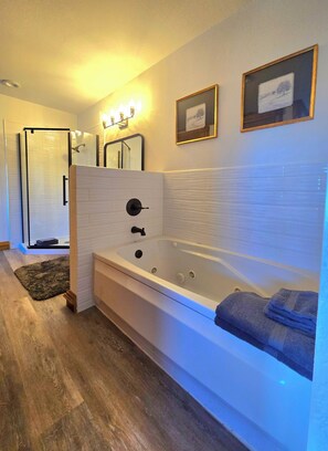 Jetted bath, hair dryer, towels, soap