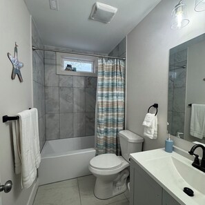 Hair dryer, towels, soap, shampoo