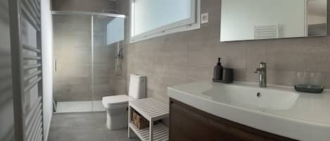 Hair dryer, towels, soap, toilet paper