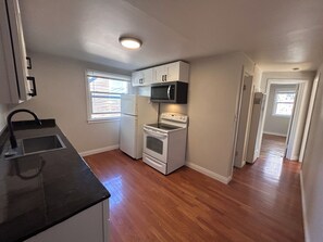 Private kitchen - Charming Avenues Apartment with Patio, Balcony & Pet-Friendly Vibes (Salt Lake City)