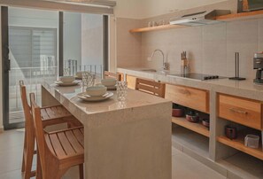 Fridge, microwave, stovetop, coffee/tea maker