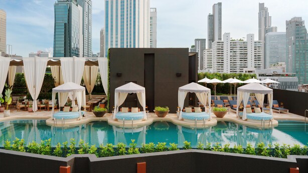 Outdoor pool, open 7:00 AM to 8:00 PM, free pool cabanas, pool loungers