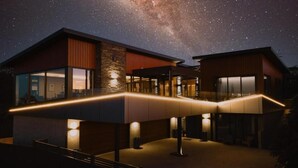 A modern house with large windows and a covered outdoor area. - Tirohanga Nui (Oamaru)