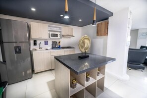 Apartamento, sacada | Cozinha privada