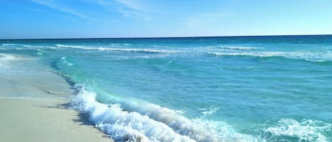On the beach, sun-loungers, beach towels