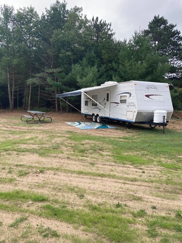 29 ft travel trailer on private campground sleeps 7 in Interlochen