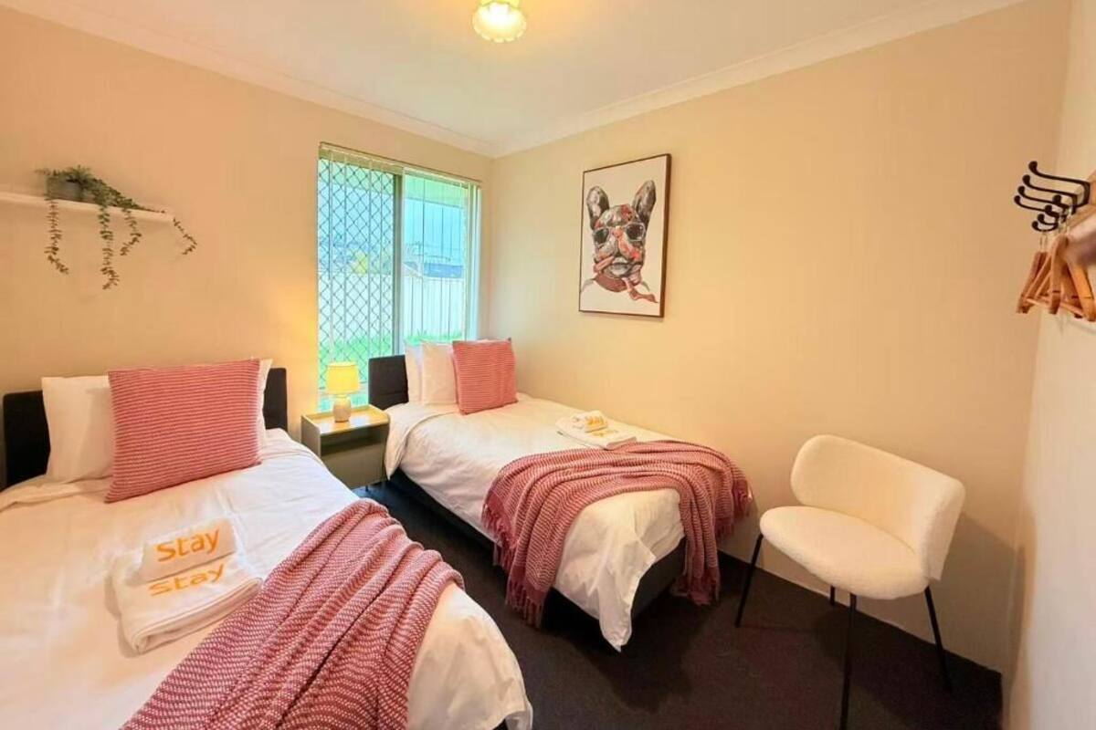 Deluxe Townhome, Garden View | Iron/ironing board, free WiFi