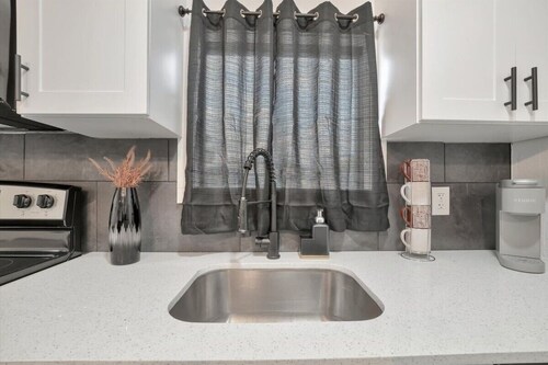 Walk to Stadium, 2 Parking spots, Dog Park, BBQ