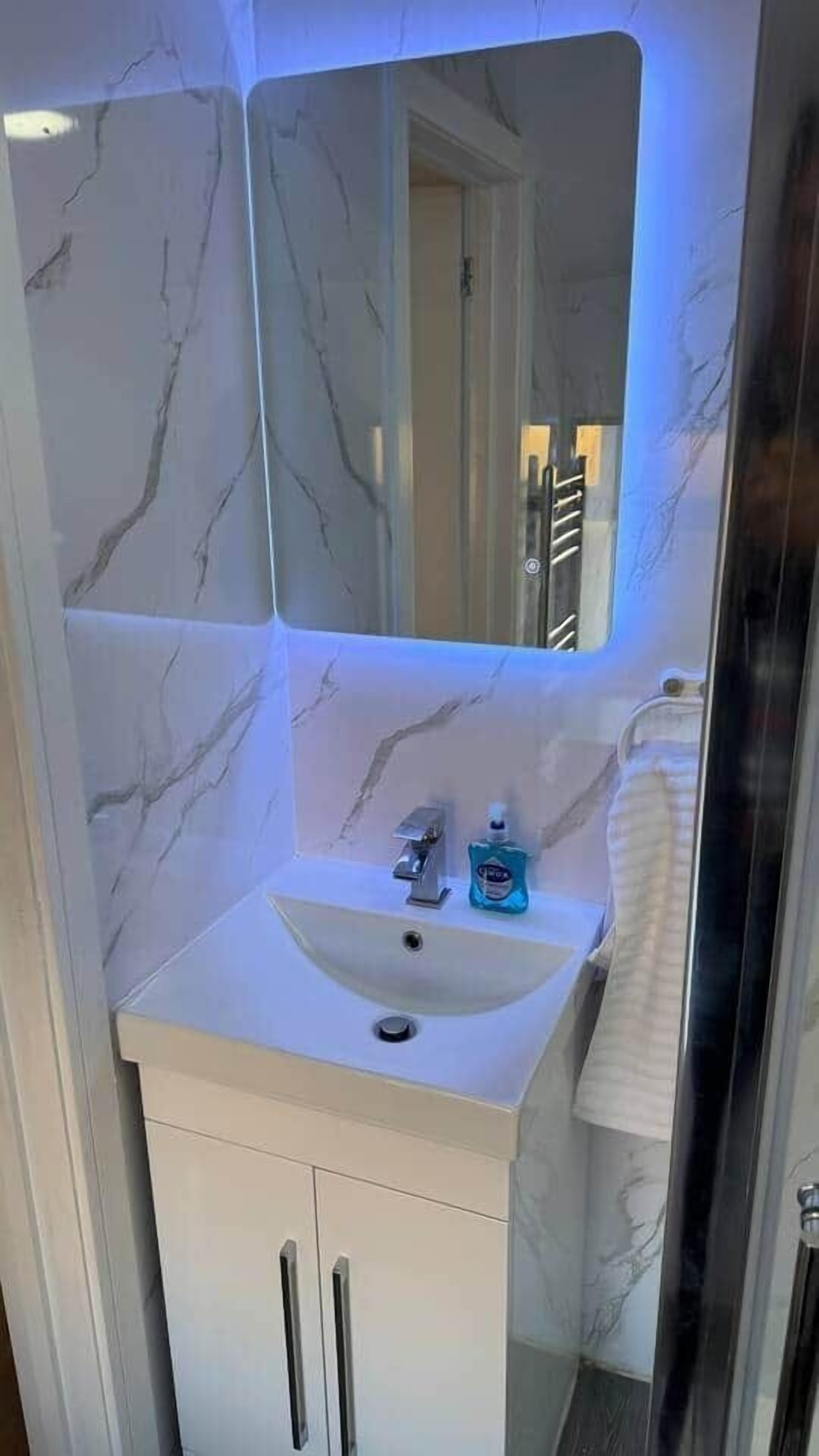 Shower, towels, toilet paper