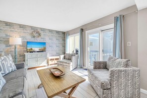 Living area - Pinnacle Port A-121- Shore Beats Work (Panama City Beach)