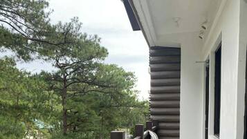 Condo, Balcony, Garden View | Property grounds