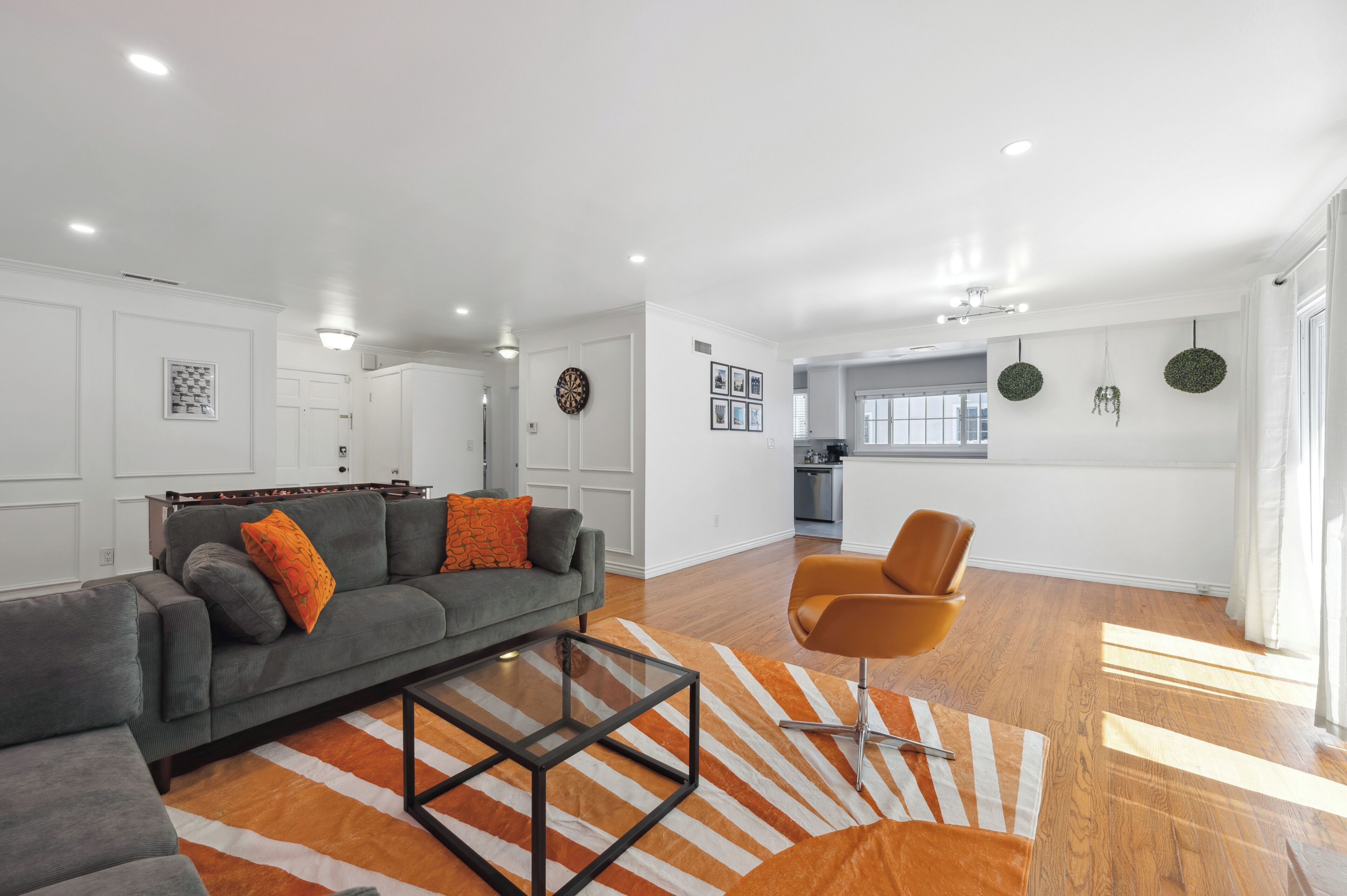 Smart TV, fireplace, foosball, books