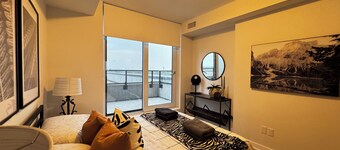 Modern 1BR + Den Condo in Downtown Square One