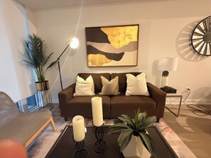 Living area - Modern 1BR + Den Condo in Downtown Square One (Mississauga)