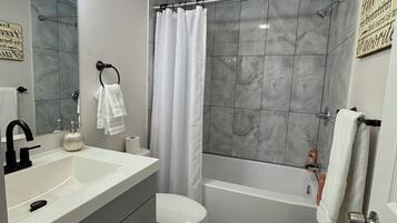 Hair dryer, towels, soap, shampoo