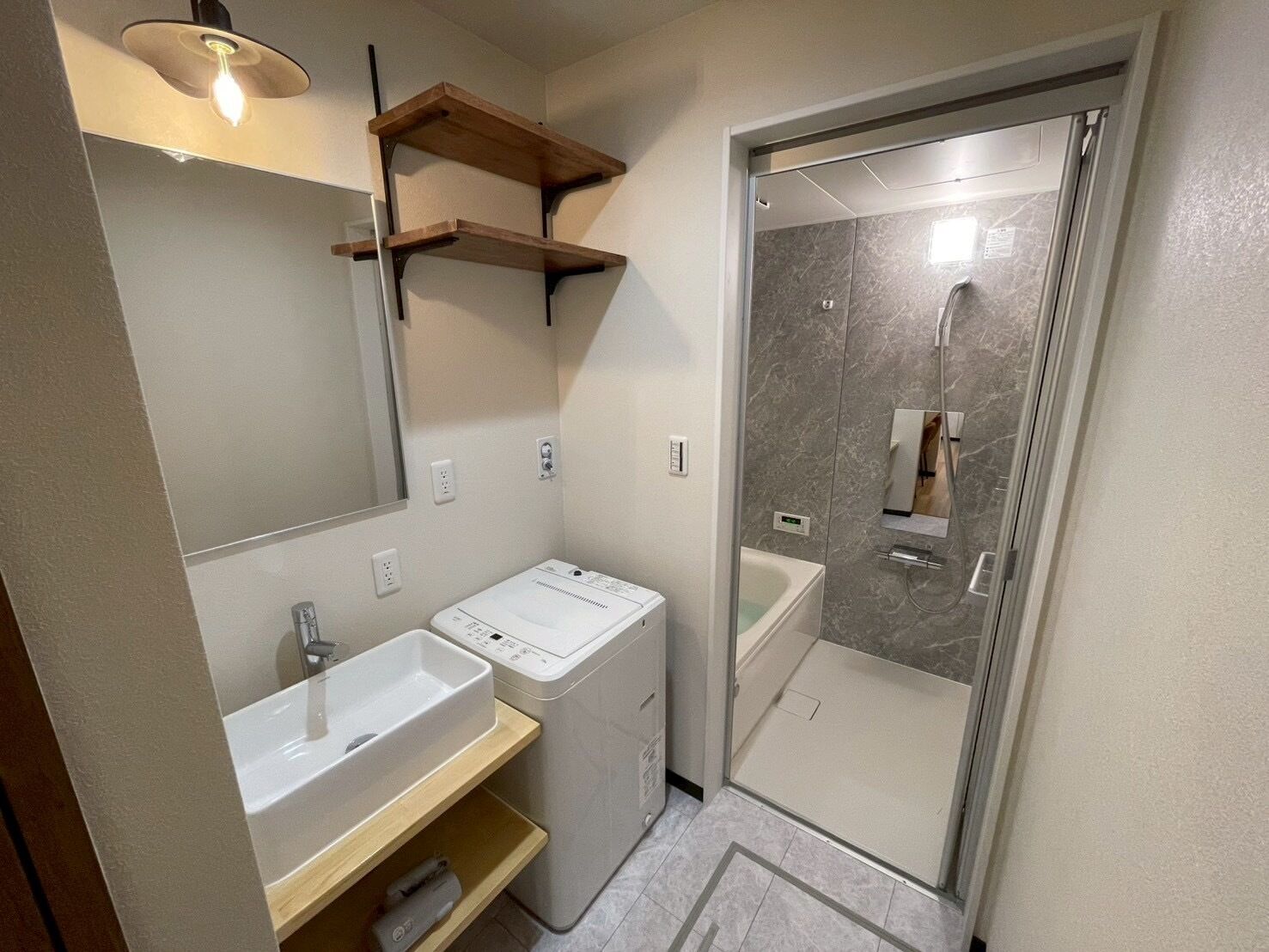 Separate tub and shower, towels, soap, shampoo