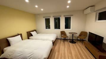 Deluxe Apartment, Garden View | Desk, free WiFi