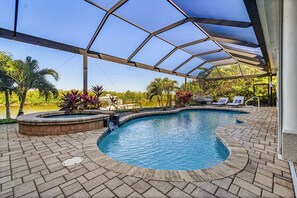 A heated pool - Villa Soleil - Gorgeous waterfront home with electric heated pool & spa - SWFL Rentals (Cape Coral)