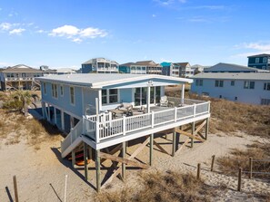 Terrace/patio - South Face: Renovated Oceanfront Pet-Friendly Home in West Beach, perfect for 7 guests! (Oak Island)