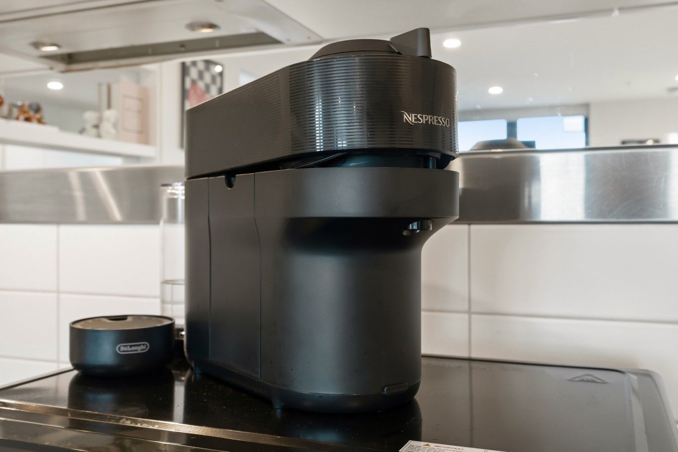 A Nespresso coffee machine on a kitchen counter.