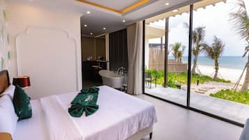 Premier Room, Ocean View | Minibar, in-room safe, blackout curtains, iron/ironing board