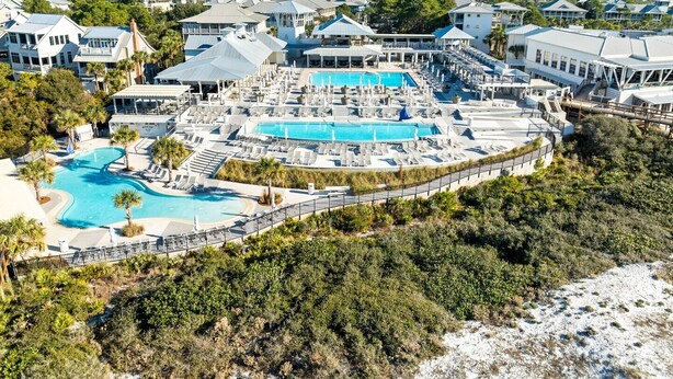 A resort with multiple swimming pools, a beach area, and a view of the surrounding landscape. - 🎨 WaterColor ~ Golf Cart | Bikes | Private Beach | 4 Heated Pools & Lazy River (Watercolor)