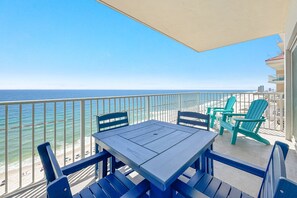 Outdoor dining - Beachfront Corner Condo w/ Pools, Hot Tub & Balcony Views | BEACHBALL PROPERTIES (Gulf Shores)