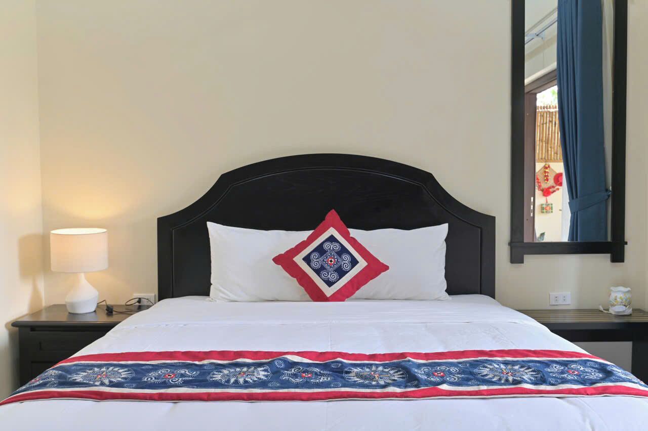 Bungalow Deluxe, ban công, quang cảnh vườn | Bàn, phòng cách âm, bàn ủi/dụng cụ ủi quần áo 