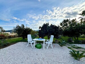 Outdoor dining - " Happy House With Garden Deluxe " (Cardedu)