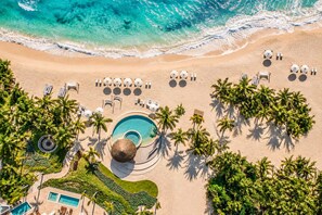 An aerial view of a beach resort with a pool, sun loungers, and palm trees. - Corasol Villa · 4 King Suites & Private Pool (Playa del Carmen)