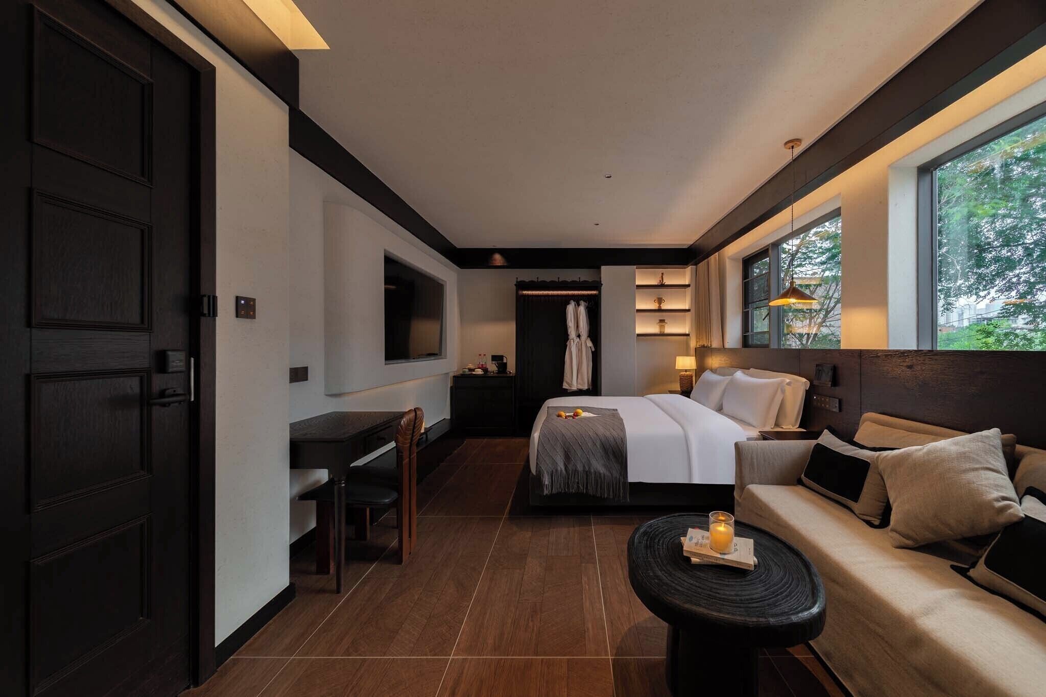 Business-Doppelzimmer, Stadtblick | Daunenbettdecken, Minibar, Verdunkelungsvorhänge, schallisolierte Zimmer