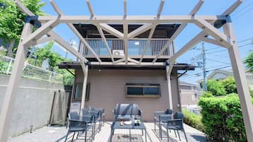 Casa família, vista para o jardim | Terraço/pátio