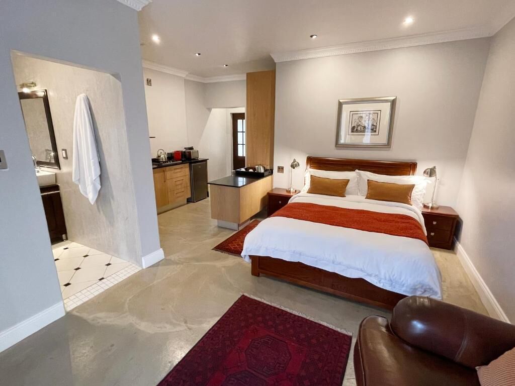 Studio Suite Superior, patio, pemandangan kebun | Brankas dan Wi-Fi gratis