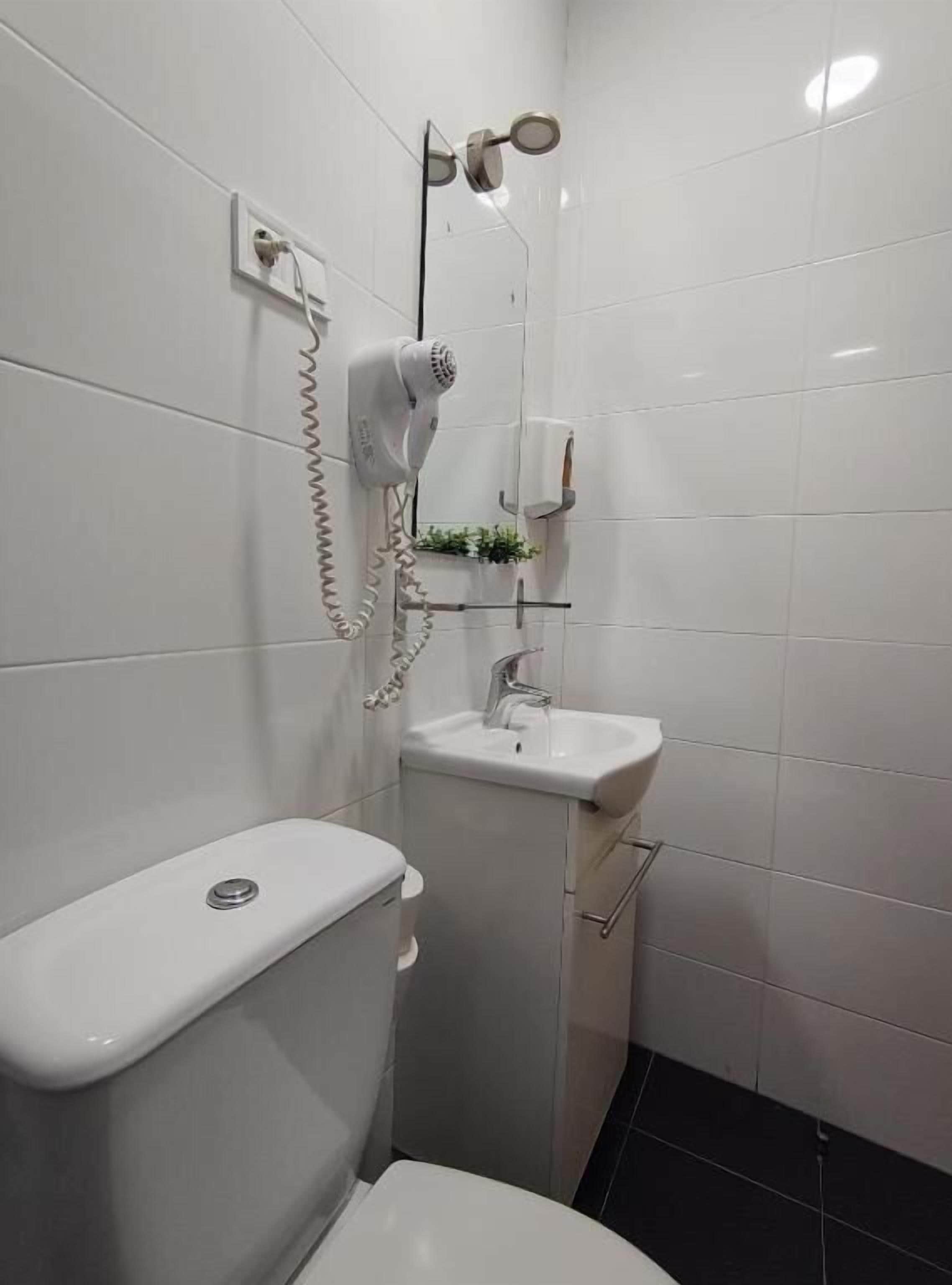 Standard Double Room, Courtyard View | Bathroom | Shower, hair dryer, towels, soap