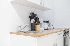 Basic Apartment | Private kitchen - Comfy 4BR Apt Near AKH Hospital WiFi (Vienna)