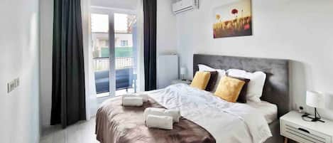 1 غرفة نوم ومكواة/لوح كي وخدمة الإنترنت وملاءات أسرّة