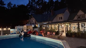 Seasonal outdoor pool, pool umbrellas, pool loungers