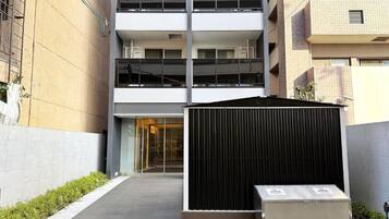 Quarto duplo conforto, sacada, vista para a cidade | Fachada