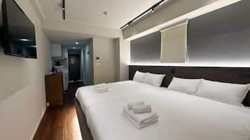 Comfort Twin Room, Balcony, City View | Down comforters, desk, laptop workspace, blackout drapes