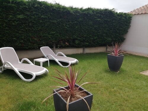 Fenced house with garage in quiet area