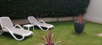 Fenced house with garage in quiet area