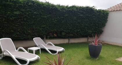 Fenced house with garage in quiet area