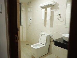 Shower, hair dryer, slippers, towels